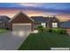 Beautiful brick home with a well-kept lawn, shown during twilight at 375 Oakpark Ter, Mcdonough, GA 30253