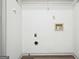 Unfinished basement space with electrical outlets and wire shelving at 2047 Charter Ln, Lithonia, GA 30058