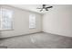 Bright bedroom with large windows and a ceiling fan at 2047 Charter Ln, Lithonia, GA 30058