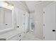 Bright bathroom featuring a marble vanity top and tile flooring at 1291 Interlaken Pass, Jonesboro, GA 30238