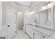 Spacious bathroom with marble vanity, mirror, and a separate toilet room at 1291 Interlaken Pass, Jonesboro, GA 30238