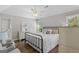 Comfortable bedroom offers hardwood floors and a neutral color scheme at 1291 Interlaken Pass, Jonesboro, GA 30238