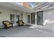 Covered patio featuring seating, offering a relaxing outdoor space at 1291 Interlaken Pass, Jonesboro, GA 30238