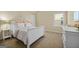 Cozy bedroom with natural light and a calm atmosphere, perfect for relaxation and restful nights at 2385 Aukerman Trce # 80, Hampton, GA 30228
