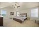 Spacious main bedroom with natural light, calm atmosphere, and space for dressers and benches at 2385 Aukerman Trce # 80, Hampton, GA 30228