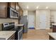 Well-equipped kitchen with stainless steel appliances, granite countertops, and ample cabinet space at 2385 Aukerman Trce # 80, Hampton, GA 30228