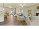 Open living room boasts hardwood floors, a fireplace, and an open staircase at 2385 Aukerman Trce # 80, Hampton, GA 30228
