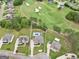 Beautiful aerial view of a lovely home featuring a backyard pool and an adjacent golf course at 3709 Royer Ln # 23, Hampton, GA 30228