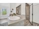 Bathroom with soaking tub, tiled shower, decor and plants at 3709 Royer Ln # 23, Hampton, GA 30228