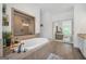 Bathroom with soaking tub and walk-in shower, plants and decor at 3709 Royer Ln # 23, Hampton, GA 30228