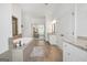 Bright bathroom with tub, walk-in shower, double vanity and tile floors at 3709 Royer Ln # 23, Hampton, GA 30228