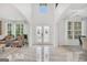Bright foyer with marble floors, decorative doors, and a view into adjacent living spaces at 3709 Royer Ln # 23, Hampton, GA 30228
