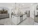 Large kitchen with granite countertops, white cabinets, stainless steel appliances, and an open layout great for entertaining at 3709 Royer Ln # 23, Hampton, GA 30228