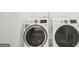Laundry Room with front loading GE washer and dryer at 3709 Royer Ln # 23, Hampton, GA 30228