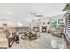 Spacious living room with marble floors, a fireplace, and expansive windows offering a bright and airy feel at 3709 Royer Ln # 23, Hampton, GA 30228