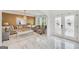 Elegant living room featuring marble floors, stylish furniture, and a decorative mirror accent wall at 3709 Royer Ln # 23, Hampton, GA 30228