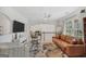 Open loft area with a cozy leather sofa and a view to the lower level at 3709 Royer Ln # 23, Hampton, GA 30228