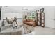 Upstairs loft area with a seating area, bright natural light, and an airy, open feel at 3709 Royer Ln # 23, Hampton, GA 30228
