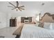 Spacious bedroom with sitting area and fireplace view, with modern neutral decor at 3709 Royer Ln # 23, Hampton, GA 30228