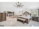 Open-concept Primary suite featuring fireplace and sitting area with white tile flooring at 3709 Royer Ln # 23, Hampton, GA 30228