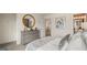 This bedroom features an ensuite bathroom and ample closet space at 1808 Quaker St, Hampton, GA 30228