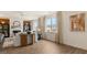 Bright and airy living room featuring ample windows and a neutral color scheme at 1808 Quaker St, Hampton, GA 30228