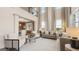 Bright living room with soaring ceilings, large windows, and neutral decor at 1808 Quaker St, Hampton, GA 30228