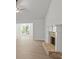 Bright living room featuring a fireplace and durable floors at 3269 Broadnax Mill Rd # 1, Loganville, GA 30052
