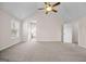 Large bedroom with vaulted ceiling, soft carpet, and neutral paint at 2373 Aukerman Trce # 83, Hampton, GA 30228