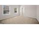 Bedroom with carpet, two windows, and closet with open door, bright and airy at 2373 Aukerman Trce # 83, Hampton, GA 30228