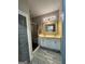 Bright bathroom with double vanity, shower, and modern fixtures at 59 S Old Hwy 27, Roopville, GA 30170