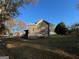 View of home showing the yard and the house's construction at 59 S Old Hwy 27, Roopville, GA 30170