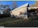 Exterior of home with shutters and patio at 59 S Old Hwy 27, Roopville, GA 30170