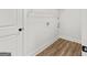 Bright laundry room with washer hookup and ample shelving space at 3261 Broadnax Mill Rd # 2, Loganville, GA 30052