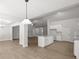 Spacious living area featuring kitchen island and connecting dining and Gathering room at 3251 Broadnax Mill Rd # 3, Loganville, GA 30052