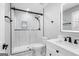 Updated bathroom featuring a glass-enclosed shower, modern fixtures, and a sleek vanity at 5109 Dogwood Hills Dr, Sugar Hill, GA 30518