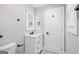Bathroom featuring a modern vanity, a sleek lighted mirror, and updated fixtures at 5109 Dogwood Hills Dr, Sugar Hill, GA 30518