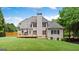 Large backyard with patio area and luscious green lawn at 6209 Benbrooke Nw Dr, Acworth, GA 30101