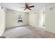 Spacious bedroom with window, ceiling fan, and textured ceiling at 130 Ashley Trace Dr, Locust Grove, GA 30248