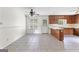 View of an eat-in kitchen with linoleum tile flooring and a view of the back door at 130 Ashley Trace Dr, Locust Grove, GA 30248