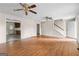 Spacious living room featuring stairs and an entrance to the kitchen at 130 Ashley Trace Dr, Locust Grove, GA 30248