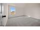 Well-lit carpeted bedroom with a bright window offering a great view at 2381 Aukerman Trce # 81, Hampton, GA 30228