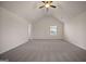 Large, open bedroom with high ceilings and plush carpeting, a large window brings in light at 2381 Aukerman Trce # 81, Hampton, GA 30228