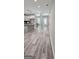 An open-concept design featuring hardwood floors and leading into the spacious kitchen and dining area at 6093 Wayfarer Dr, Villa Rica, GA 30180