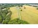 Aerial view of countryside property with long driveway and open pastureland at 290 Weldon Rd, Fayetteville, GA 30215