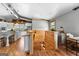 Open kitchen/office space featuring hardwood floors, white cabinets, and natural light at 290 Weldon Rd, Fayetteville, GA 30215