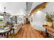 Open living room featuring hardwood floors, exposed ceiling, and natural light at 290 Weldon Rd, Fayetteville, GA 30215
