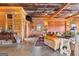 Cozy living space with wood walls, barn doors, leather sofas, and unique decor at 290 Weldon Rd, Fayetteville, GA 30215