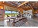 Open living space with a view of the patio, farmhouse table, and kitchen island at 290 Weldon Rd, Fayetteville, GA 30215