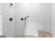 Modern shower featuring white subway tiles and dual shower heads at 290 Weldon Rd, Fayetteville, GA 30215